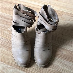 Strappy nude bootie heels